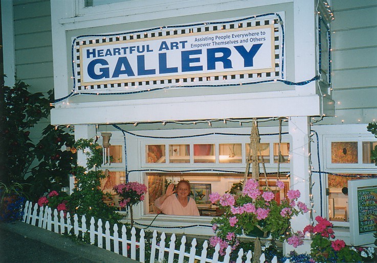 Raphaella waves to passers-by from her window at the original 40 Princess Street location